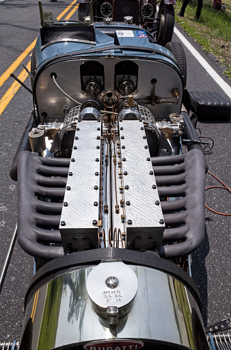 Hershey, PA, USA-June 12, 2015:  One of two 1929 Bugatti Type 45 cars built on display at The Elegance at Hershey. The 16 cylinder engine makes it special with two crankshafts and two superchargers.