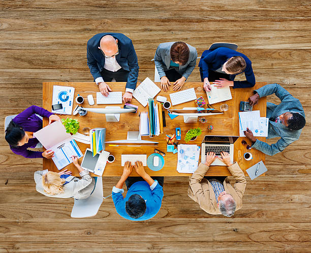 istock Group of People in a Meeting and Copy Space 477317722