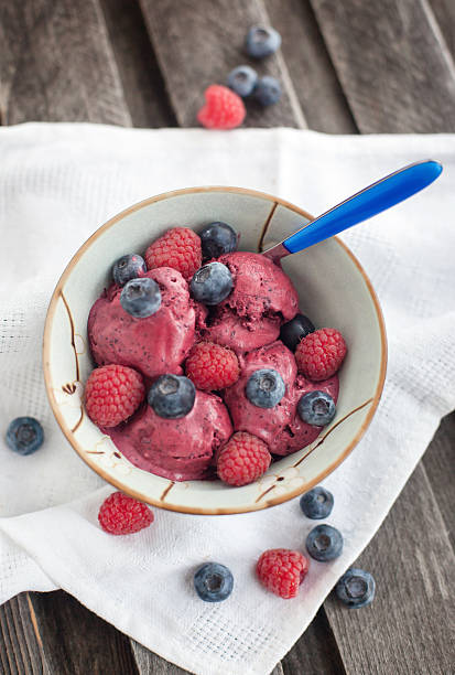 istock Berry ice cream decorated with fresh blueberries and raspberries 477323497