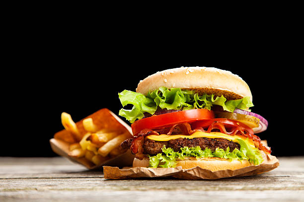 istock Delicious hamburger and fries 477325432