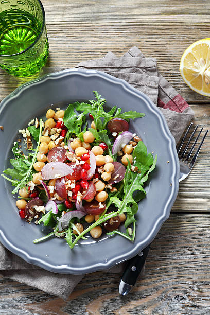 istock salad with arugula and chickpea on a plate 477325620