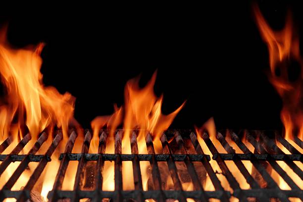istock Empty Hot Flaming Charcoal Barbecue Grill 477325728