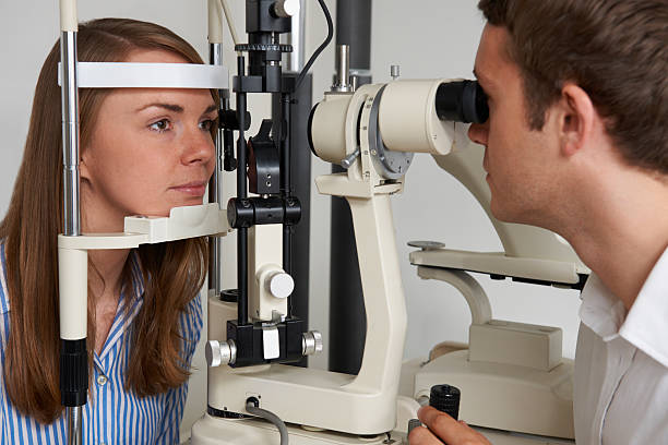 istock Woman Having Sight Test At Opticians 477327856