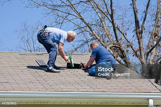 Roofing Contractors Stock Photo - Download Image Now - Damaged, Claim Form, House