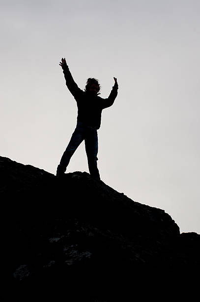 istock Black silhouette of a boy jumping 477328913