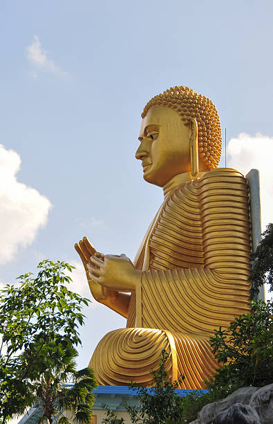 istock Buddha statue in Golden Temple in Dambulla 477330762