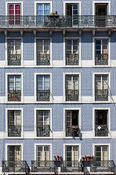 Windows of an old typical building in lower Graca district. Lisbon, Portugal.