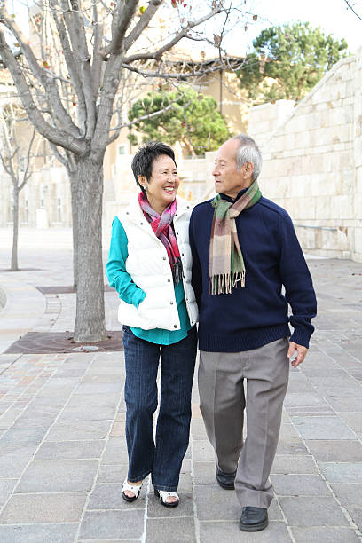istock Senior couple taking a walk looking at each other 477331749