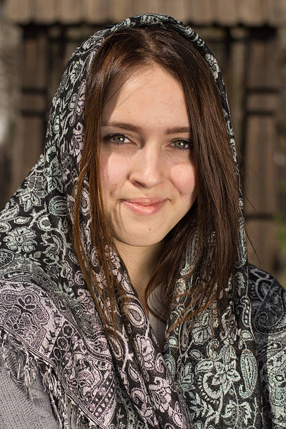 istock Girl in a scarf 477334242