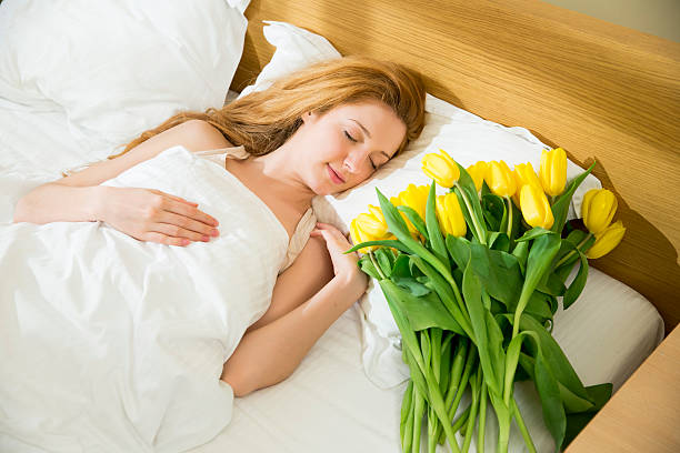 istock Woman sleeping in the bed 477335362