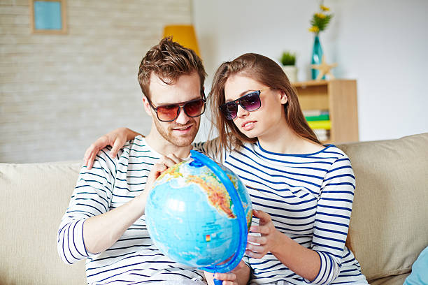 istock Couple in sunglasses 477338054