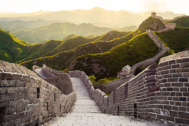 Great wall under sunshine during sunset Great wall under sunshine during sunset badaling stock pictures, royalty-free photos & images