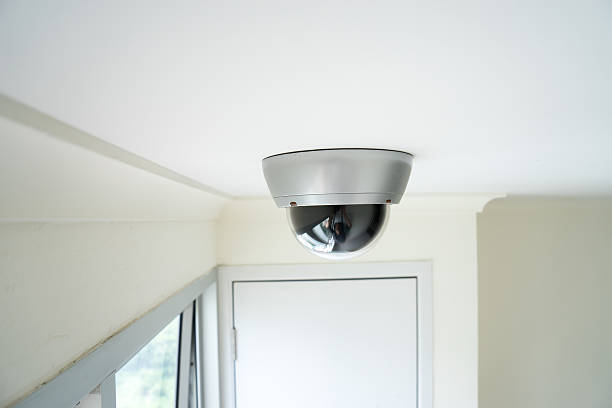 istock CCTV security camera monitor in office building 477339578