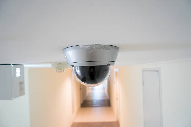 istock CCTV security camera monitor in office building 477339582