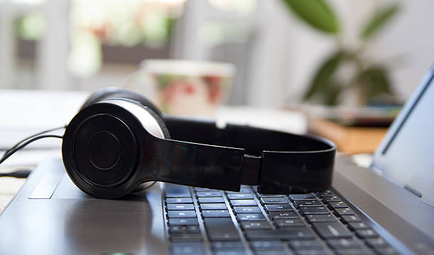 istock Headphones on laptop 477339606
