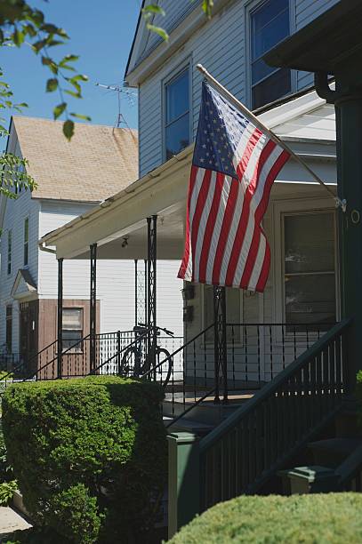istock American Flag in the Suburbs 477343797