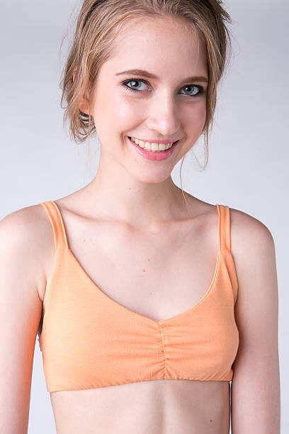 istock cheerful girl in a bathing suit 477344261