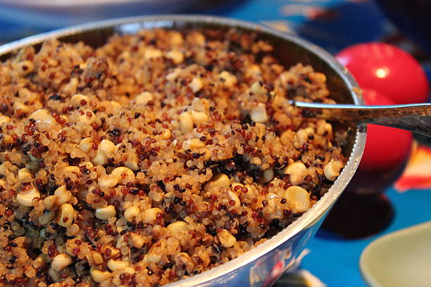 istock Quinoa Salad in Silver Bowl with Serving Spoon 477348595