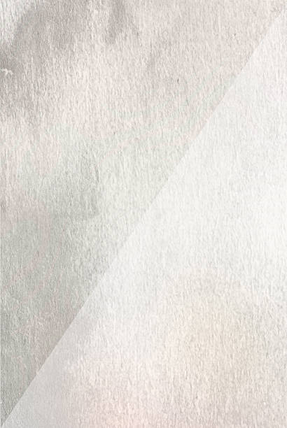 istock geometric triangle shapes  on watercolored textured paper backgr 477349882