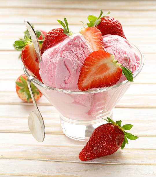 istock strawberry ice cream served with fresh berries 477350075