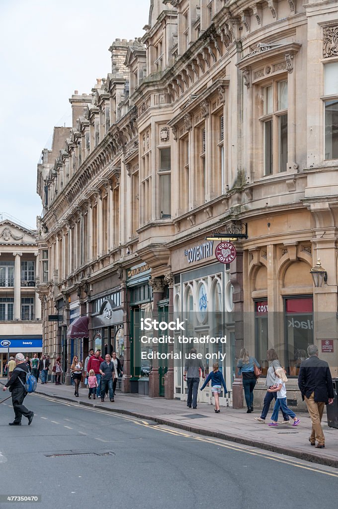 Shoppers On A Busy City Street Cheltenham, United Kingdom - September 28, 2014:  Pedestrians shopping on a busy city streets of picturesque Cheltenham In the southwest of England. 2015 Stock Photo