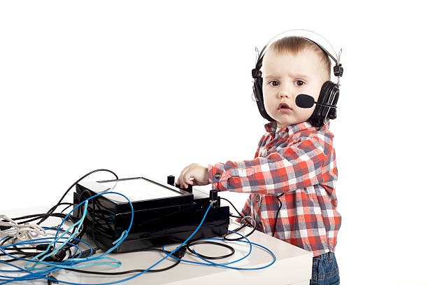 istock little boy with headphones 477362545