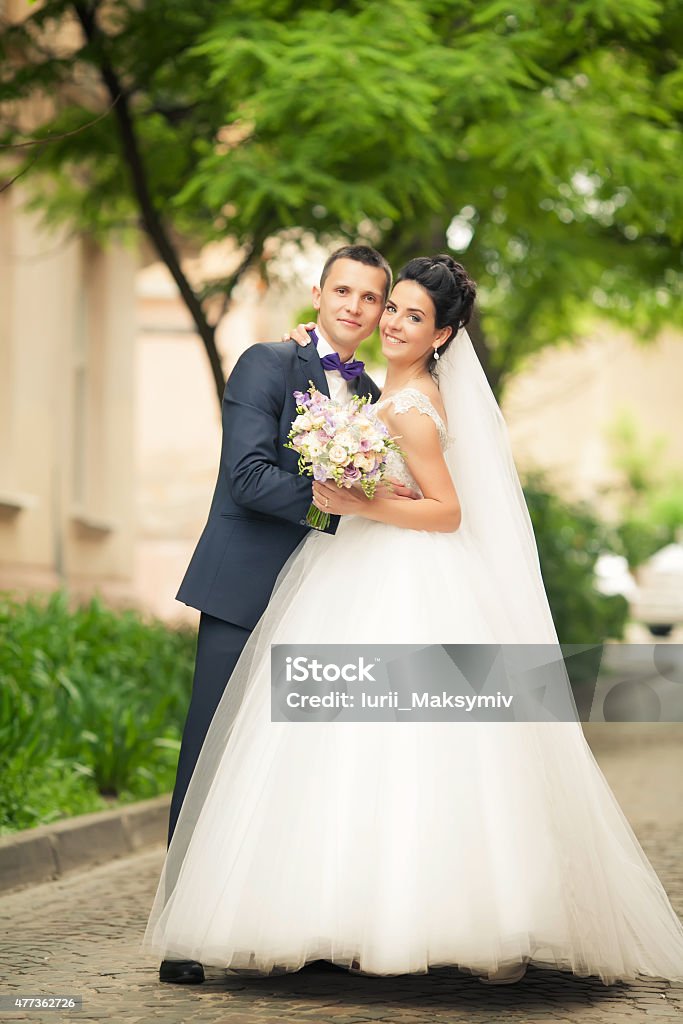 Gentle couple holding hands each other on background lviv 2015 Stock Photo