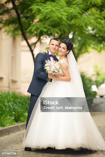 Gentle Couple Holding Hands Each Other On Background Lviv Stock Photo - Download Image Now