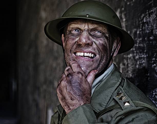 istock soldier with his hand on his chin 477365628