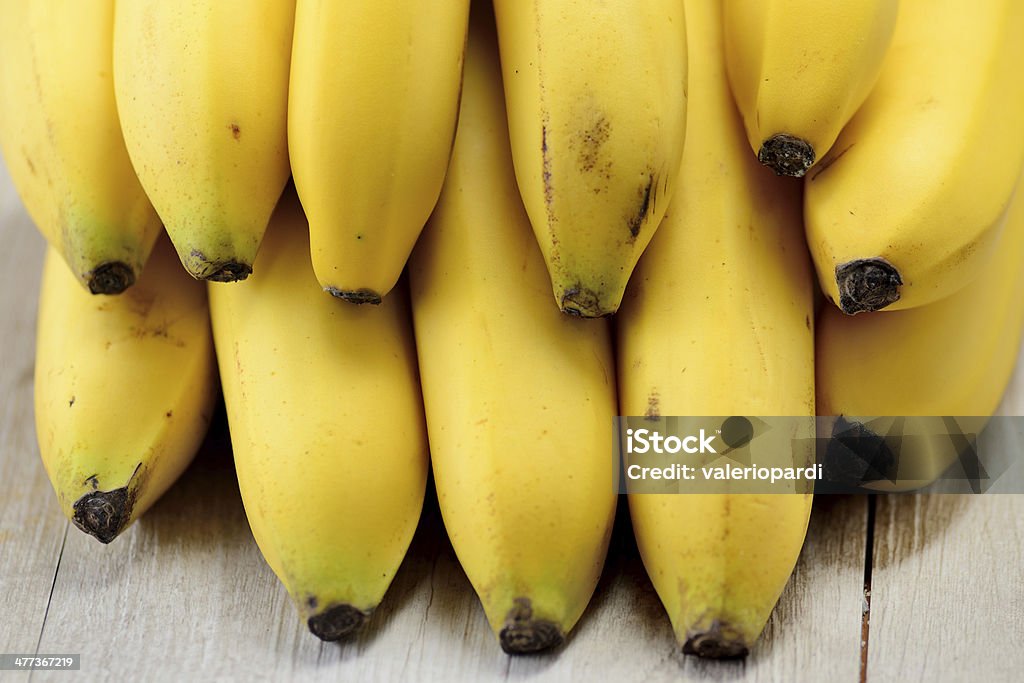 Bananas Bananas on a wooden table Banana Stock Photo