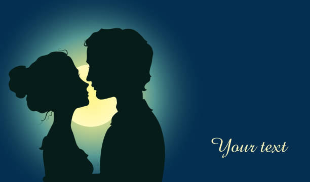 istock Silhouettes of kissing couple 477367827
