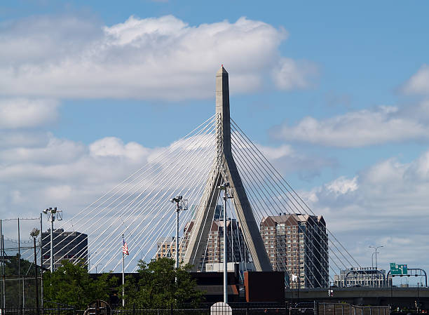 istock Bridge Tower Against Blue Sky And White Clouds 477368504