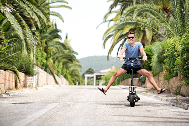 Man riding an Electric Scooter