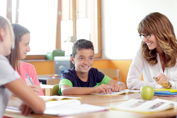 istock Schoolboys and girls are smiling 477368569