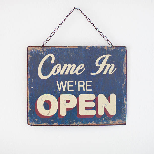 istock Come in we're open shop sign 477370899