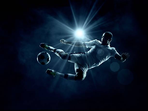 istock Soccer Player in mid-air 477373059