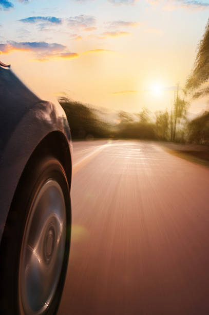 istock car on the road with motion blur background 477379675