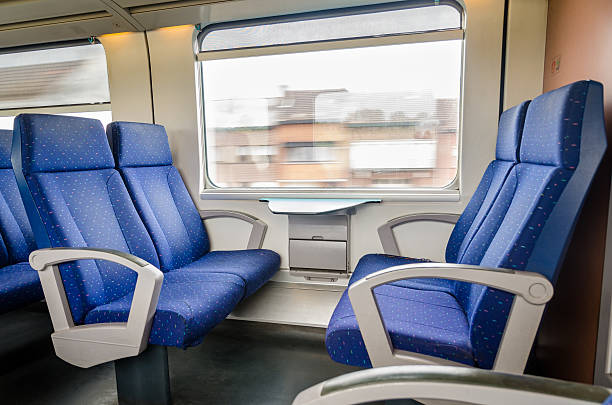 emtpy interno del treno per tempo e distanza - vehicle interior indoors window chair foto e immagini stock