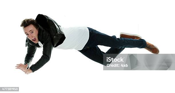 Young Man Falling Stock Photo - Download Image Now - 20-29 Years, 2015, 25-29 Years