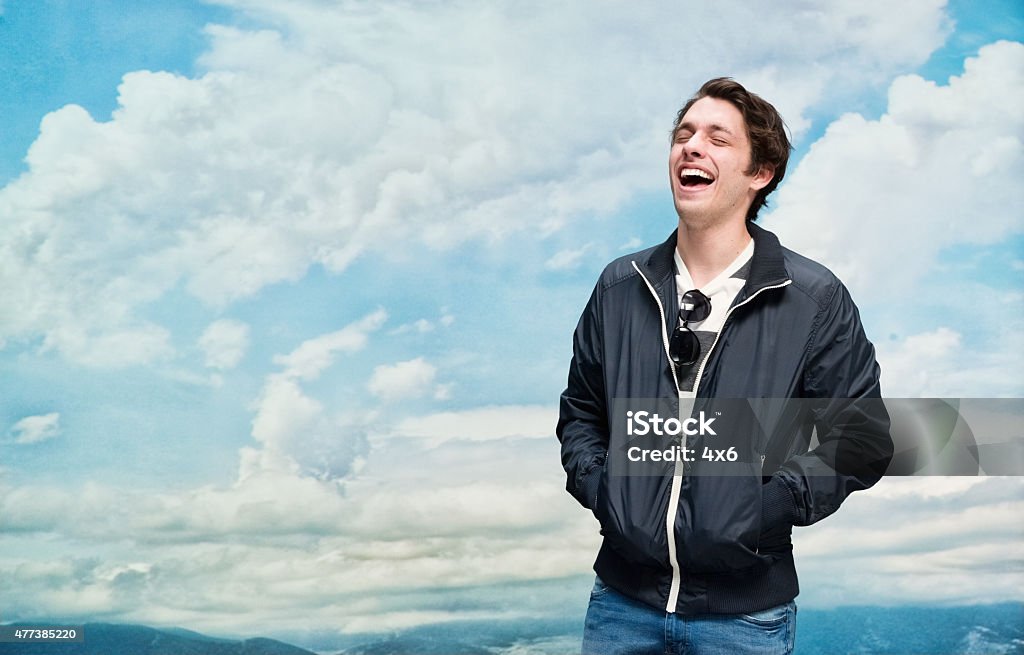 Cheerful man outdoors and laughing Cheerful man outdoors and laughinghttp://www.twodozendesign.info/i/1.png 2015 Stock Photo