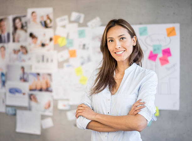 istock Asian woman working at a creative office 477385278