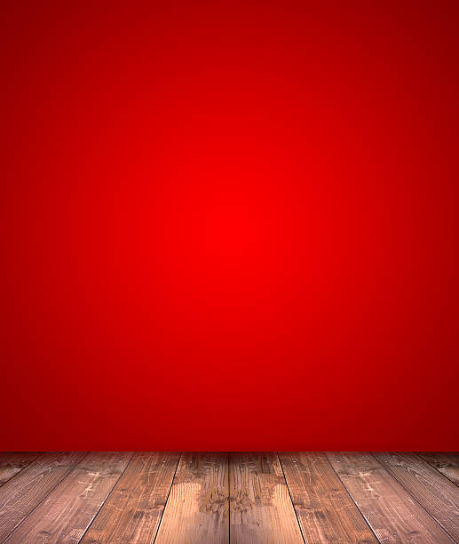 istock abstract red background with wood floor 477390800