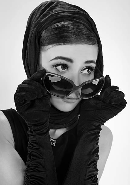 istock beautiful brunette woman in a retro style 477392880