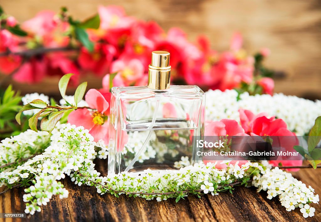 Flower Perfume Bottle Flower Perfume in Transparent Bottle with Spring Blossom 2015 Stock Photo