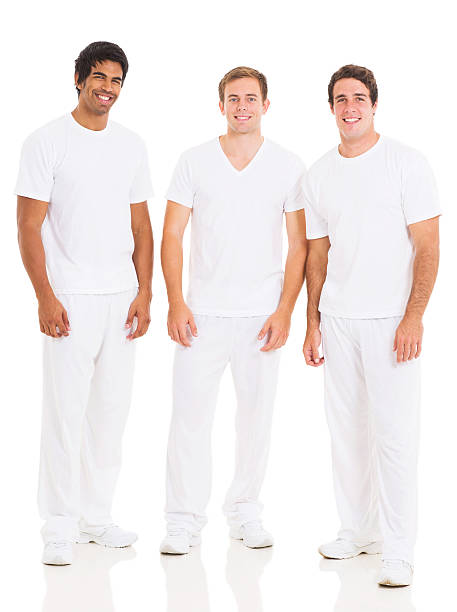 istock group of young man in white 477395059
