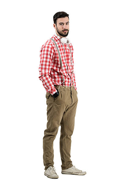 istock Young bearded dj in retro clothes looking at camera 477396864