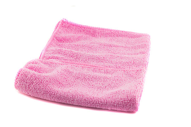 istock Pink towel folded in the shape of a square 477398536