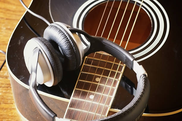 istock instrument guitar headphones and microphone 477398698