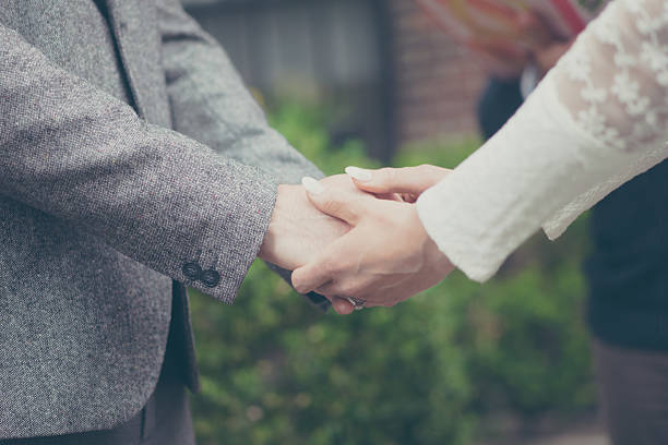 istock Bride and groom holding hands in vintage pastel colors 477399738