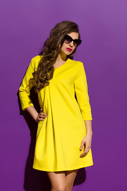 istock Fashion Model On A Purple Background 477400056
